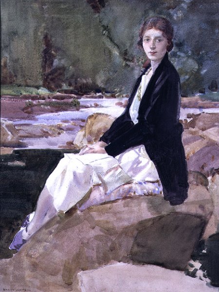 Young woman sitting upon rocks